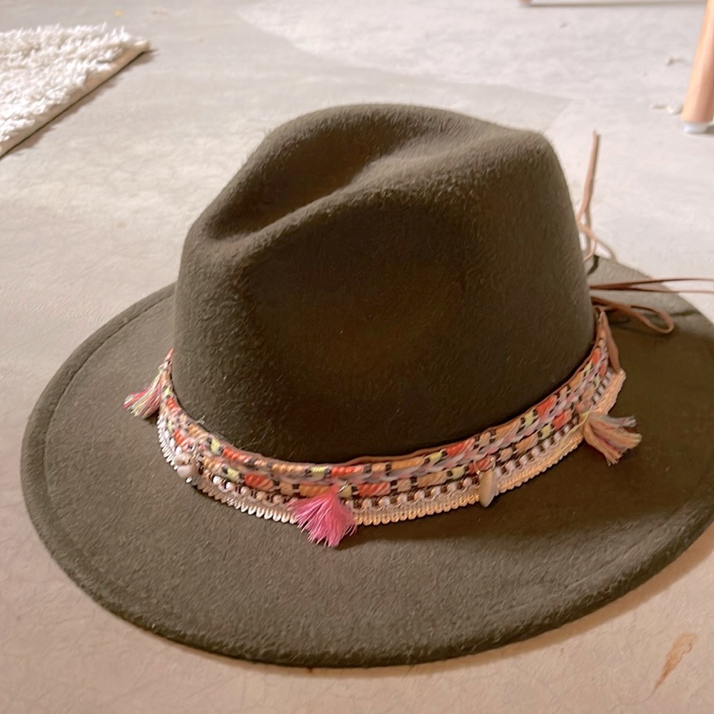 Green fedora hat.